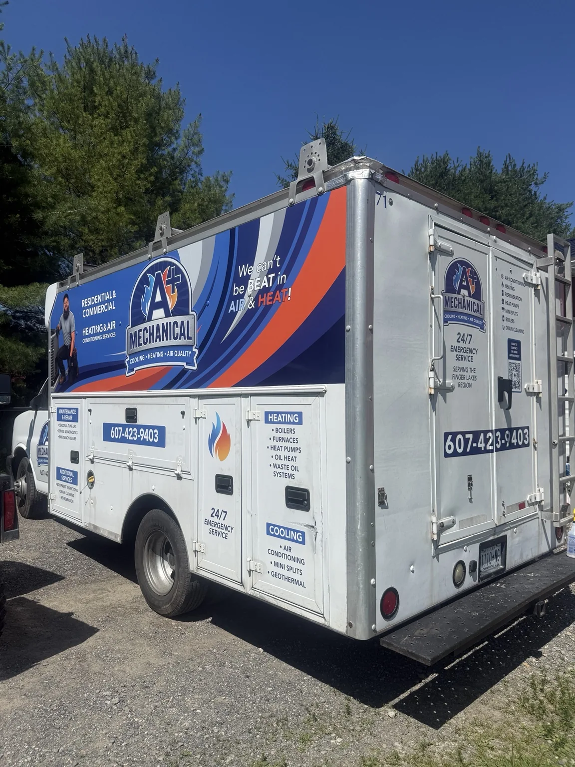 Rear and side graphics on the A+ Mechanical service truck